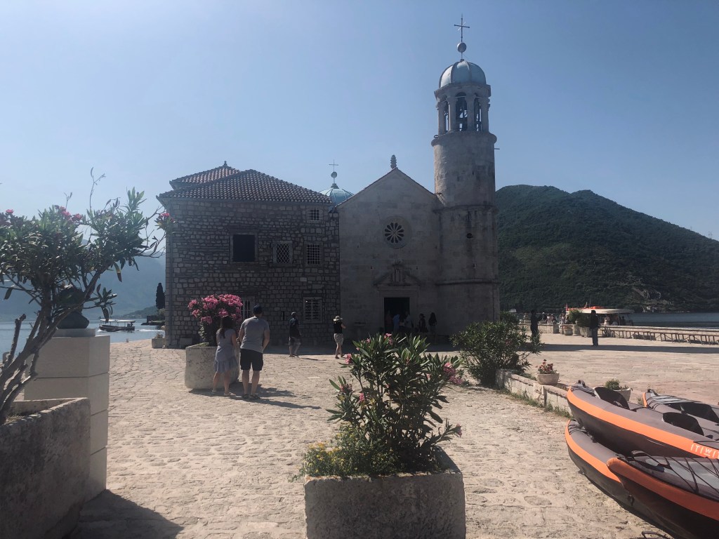 This image has an empty alt attribute; its file name is lady-of-the-rocks.jpg