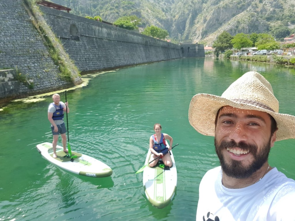 This image has an empty alt attribute; its file name is paddleboarding.jpg