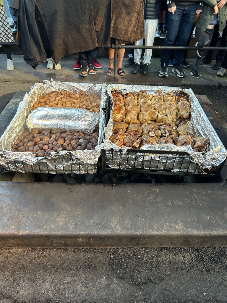 Food cooked in the Hāngī at the Maori Experience in Rotorua, New Zealand